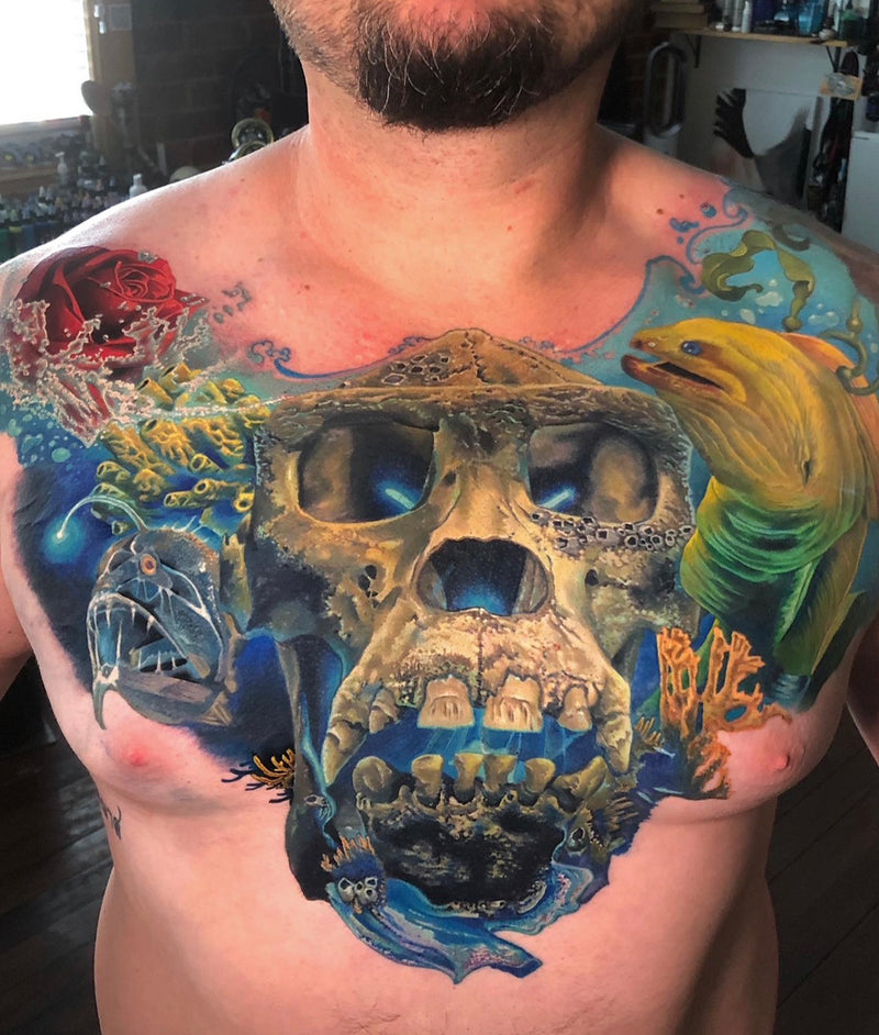 Colour realism skull chest piece by Frederick Bain
