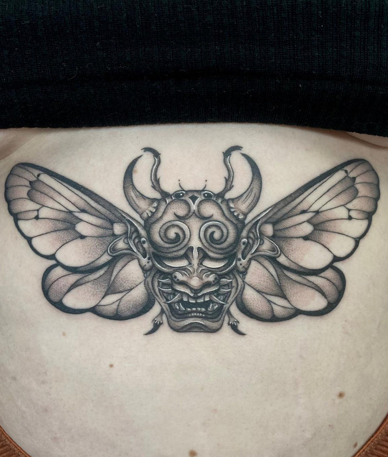 Illustrative moth stomach tattoo by Lauren Williams