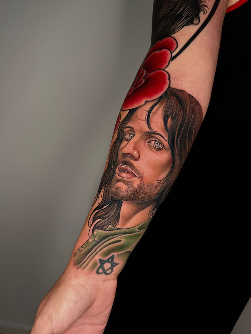 Neo-traditional portrait forearm tattoo by Bobby Dunbar