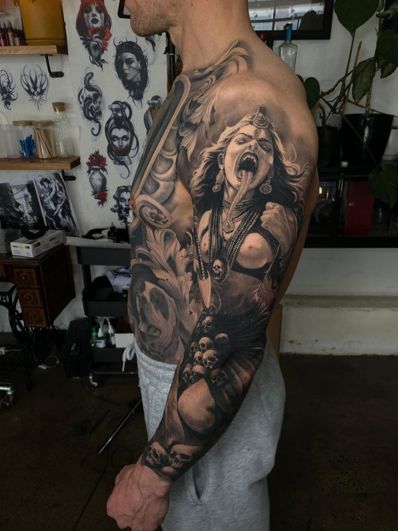 Black and grey realism sleeve by Ben Thomas